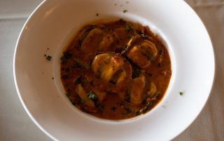 Bowl of mussels simmered in a rich tomato herb sauce served at Terrazza Greenfield
