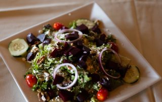 Fresh salad with beets, cucumbers, tomatoes, and cheese served at Terrazza Greenfield restaurant