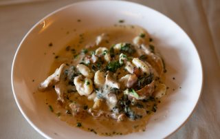 Dish in a creamy sauce with herbs served at Terrazza Greenfield restaurant